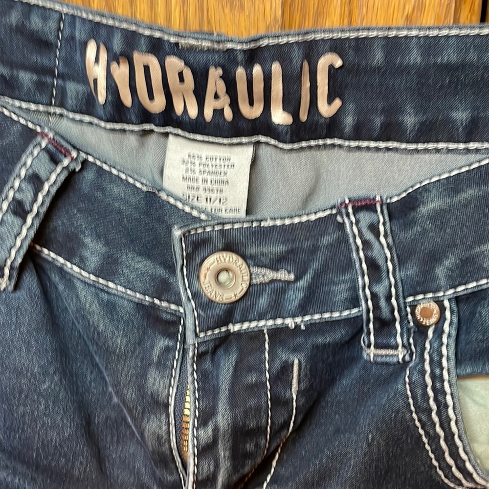 Hydraulic distressed skinny jeans